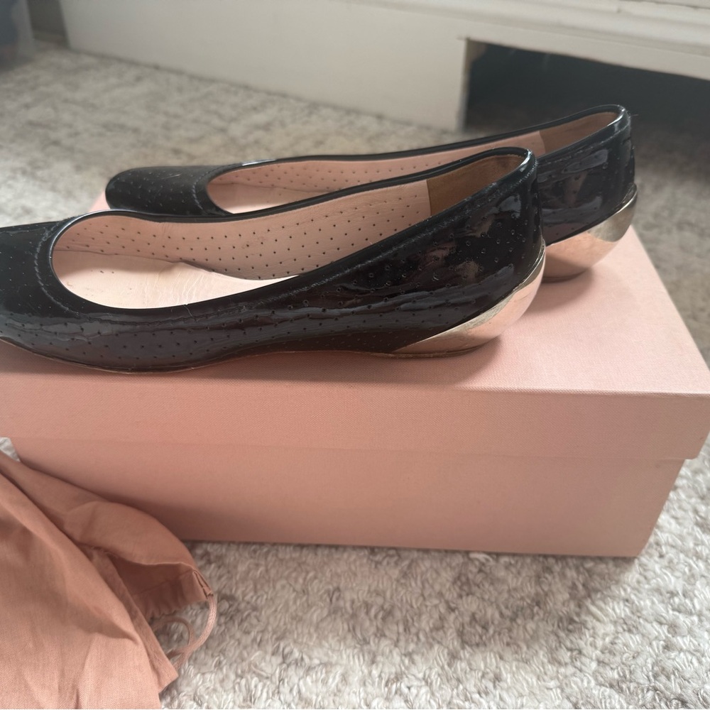 Miu Miu Black Flats with metal heel Timeless Cool & Elegance